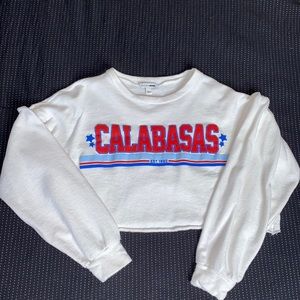 FashionNova Calabasas long sleeve crop top.